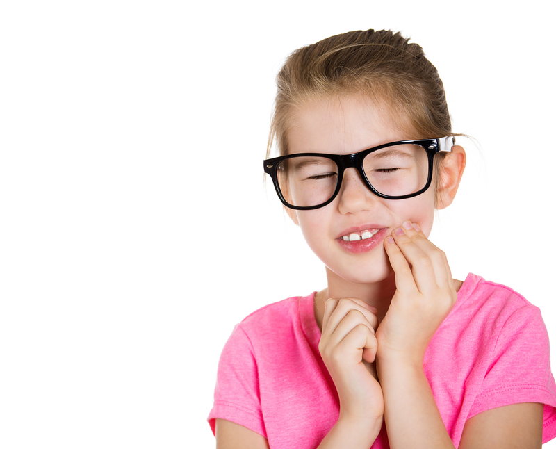 Child that is having tooth pain